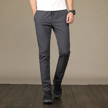 Новая летняя мужская одежда, Универсальная повседневная, со свободными карманами, прямые, не глаженые, быстросохнущие Спортивные облегающие Модные брюки из полиэстера